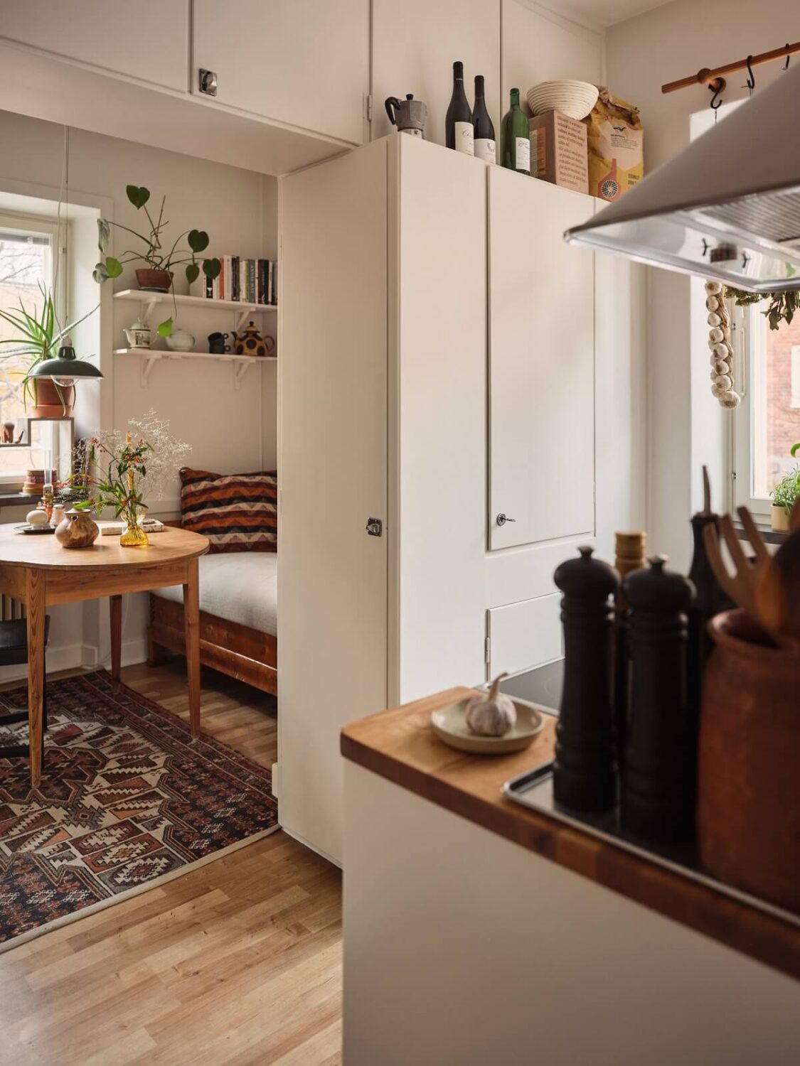 A Small Apartment with a Cozy Dining Nook 9 kitchen with dining area