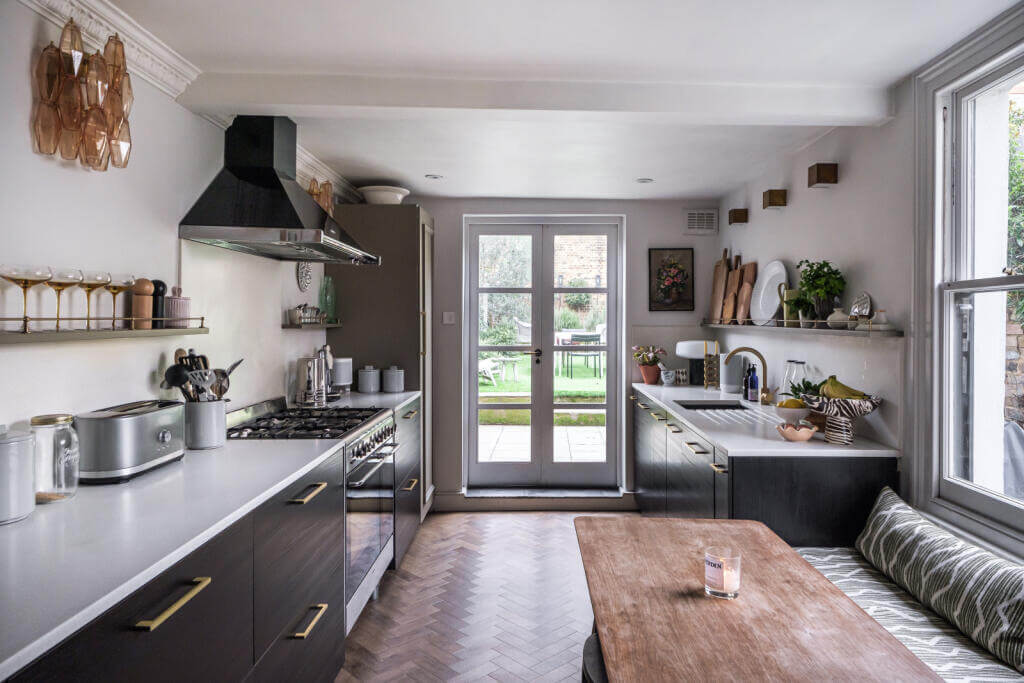 A London House Decorated in Gray and Beige Tones 10 kitchen with dining table with bench seating