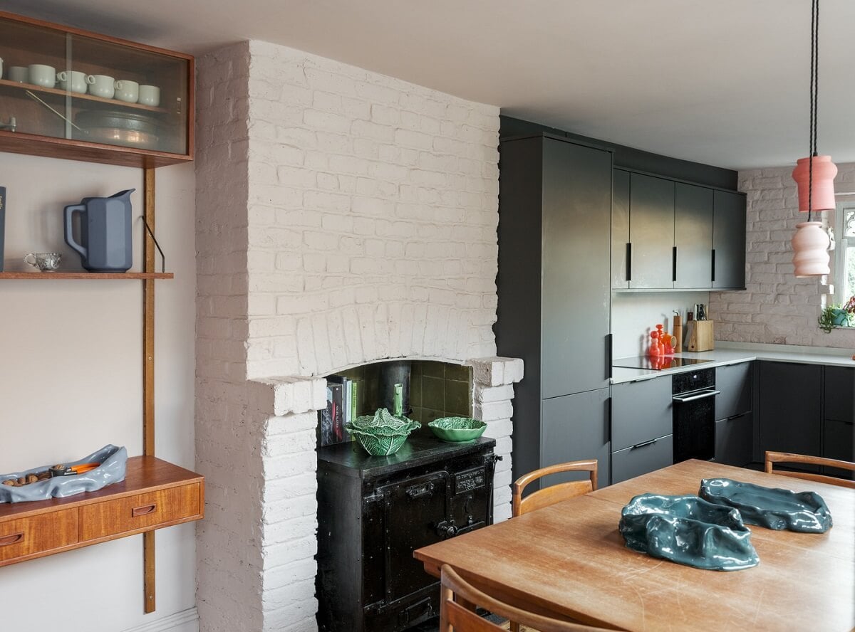 A London Home with Green Color Accents 7 kitchen with white painted brick walls