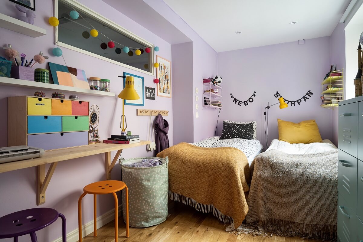 A Basement Family Apartment with Colorful Furniture and Decor 16 lavender childrens bedroom with wooden diy desk