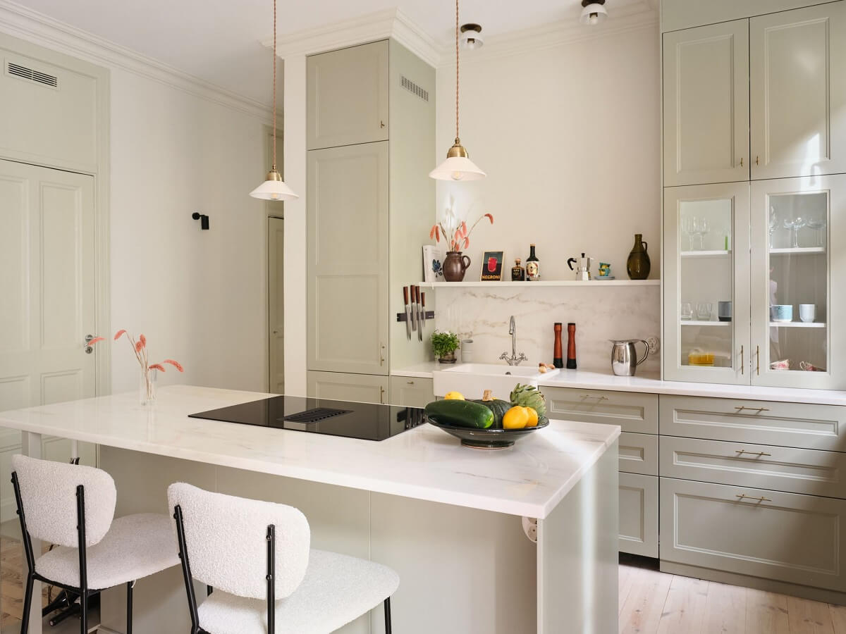 A Light Filled Duplex Apartment in Sweden 2 light gray kitchen with island