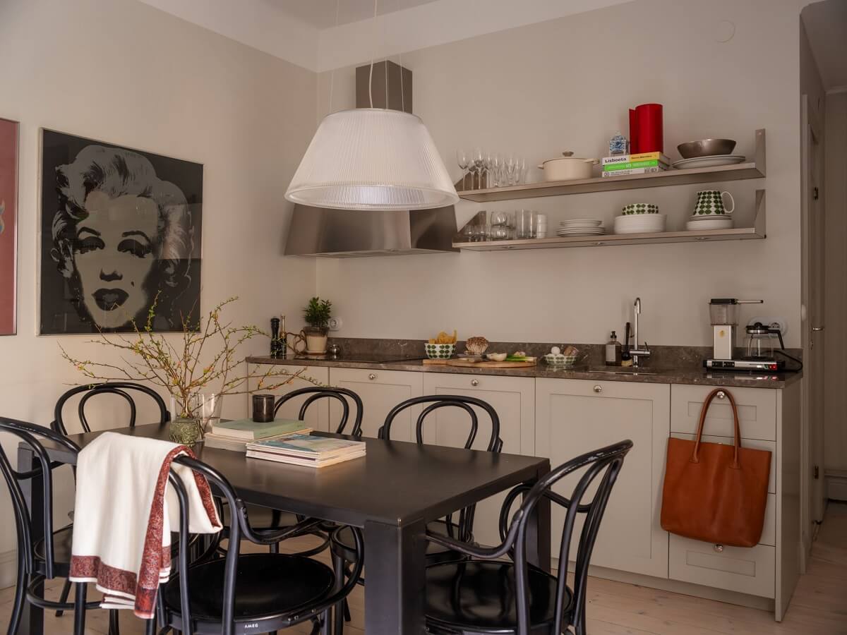 A Muted Color Palette in a Scandinavian Apartment 8 light gray kitchen with shelves