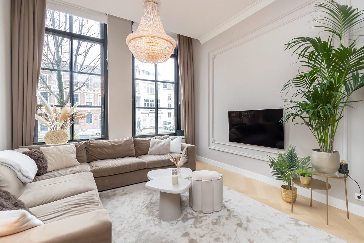 A Renovated Canal House with a Separate Pink Studio Apartment 3 light gray living room with corner sofa