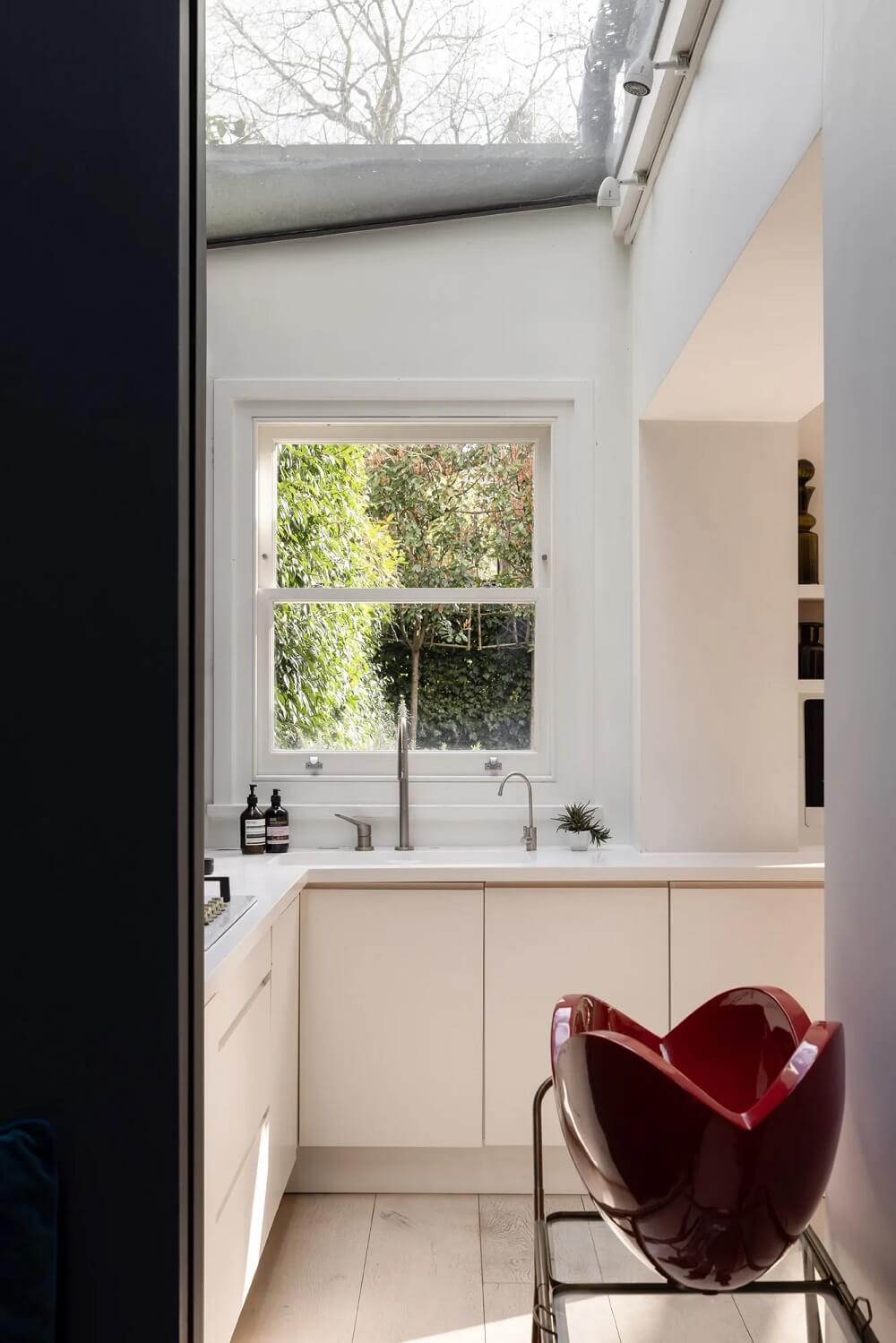 A Modern Apartment with Skylights in a Historic Building 5 light kitchen cabinets with skylight
