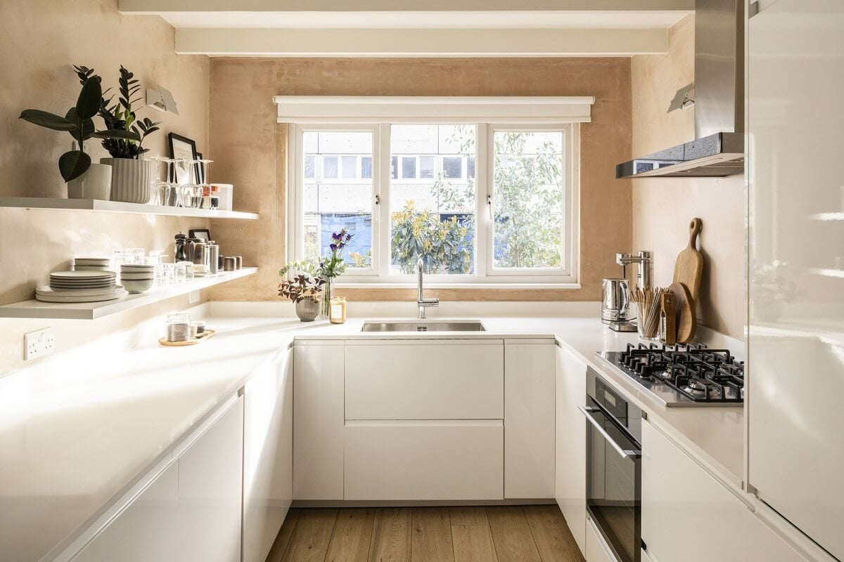 A Modern London Home with Plaster Walls 10 light modern white kitchen