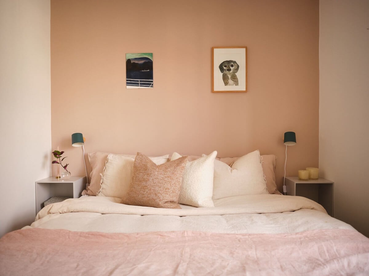 A Light Corner Apartment with a Pink Bedroom 17 light pink accent wall bedroom