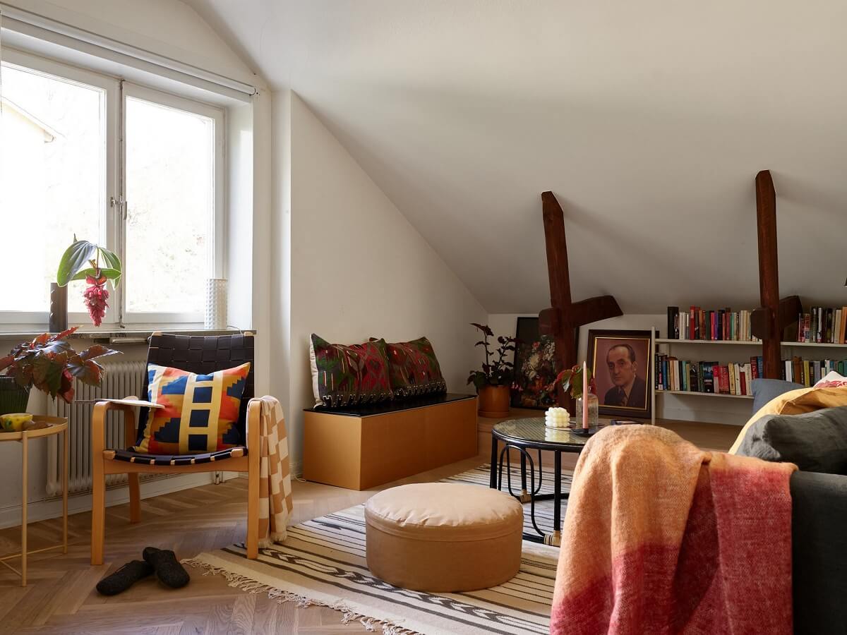 A Small Attic Apartment with a Golden Yellow Bedroom 2 living room exposed beams