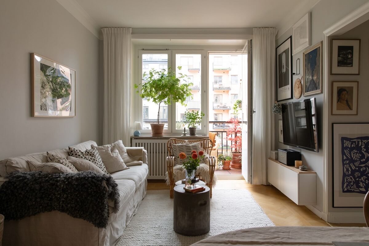 A Light Colored Swedish Apartment 2 living room gray walls gallery wall