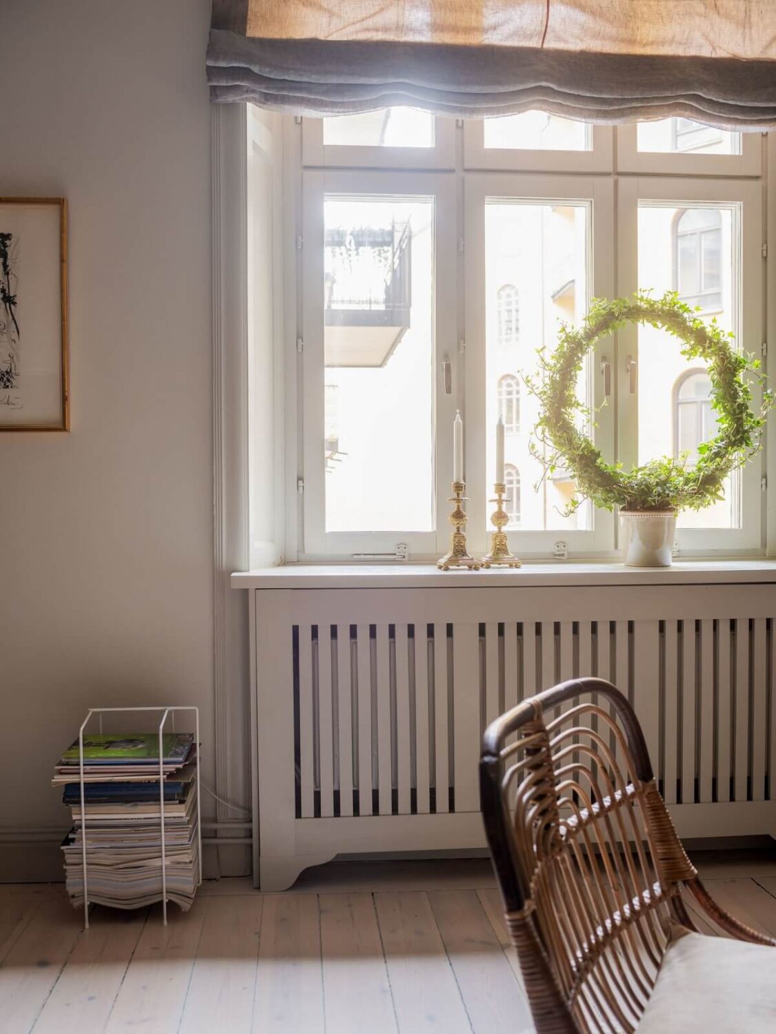 A Muted Color Palette in a Scandinavian Apartment 4 living room window