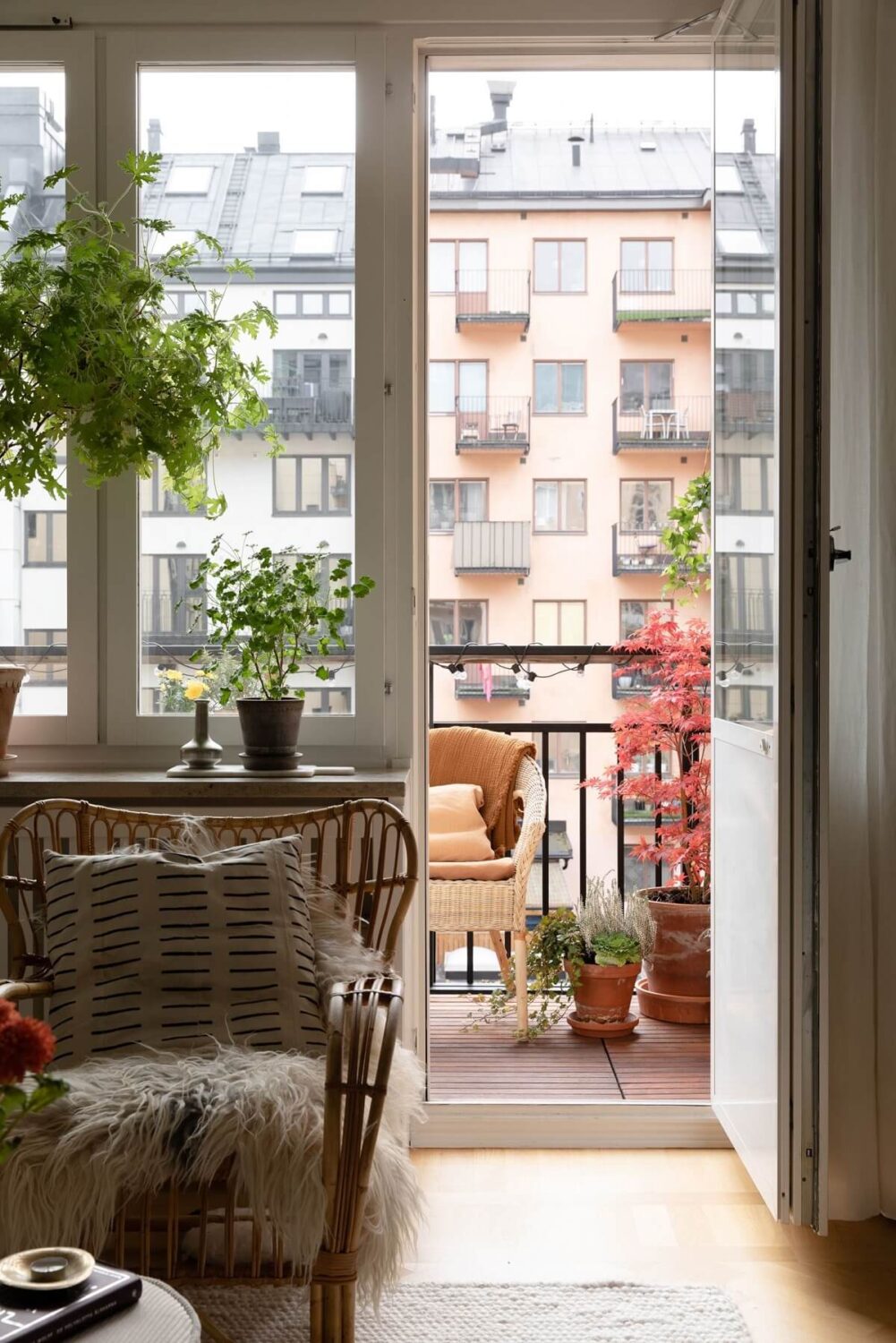 A Light Colored Swedish Apartment 4 living room with balcony