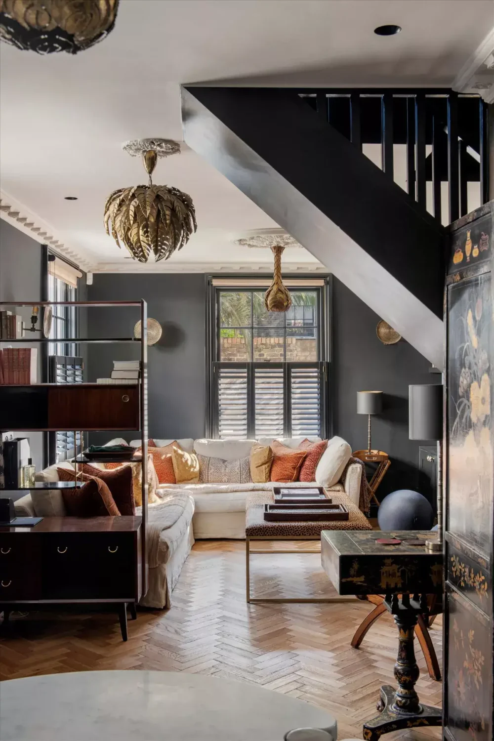 A Stylish Renovated House in Notting Hill 1 living room with dark gray wall color
