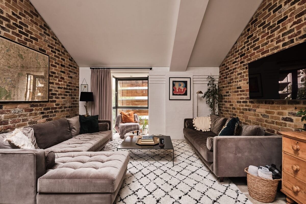 A London Warehouse Conversion with a Black deVOL Kitchen 5 living room with exposed brick walls