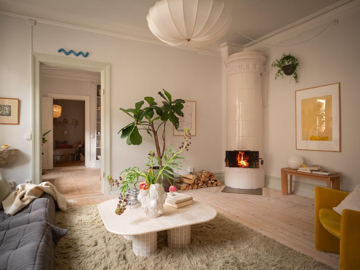 Light Rooms and Soft Color Tones in a Swedish Apartment 4 living room with fireplace