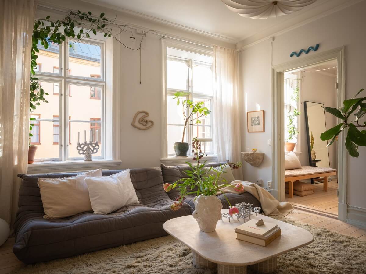 Light Rooms and Soft Color Tones in a Swedish Apartment 5 living room with ligne roset sofa
