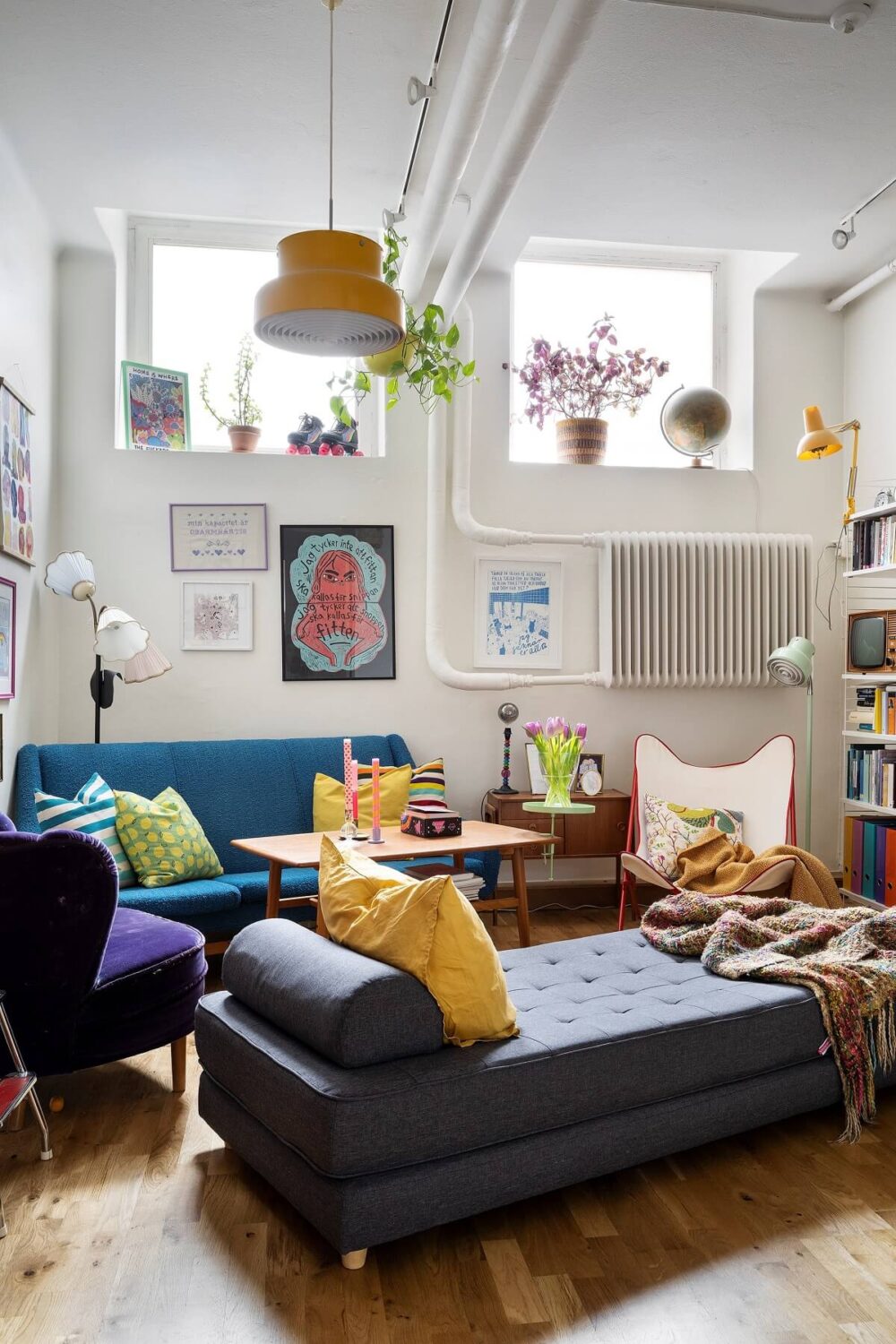 A Basement Family Apartment with Colorful Furniture and Decor 3 loft style living room with colorful decor