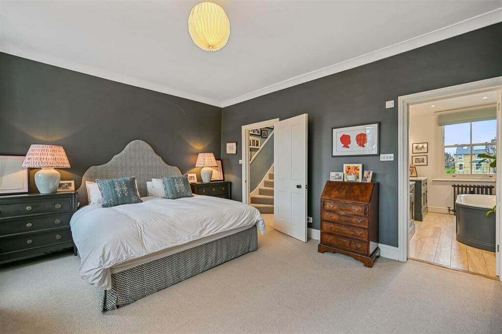 A London Family Home with Blue Color Accents 10 master bedroom with gray walls and en suite bathroom