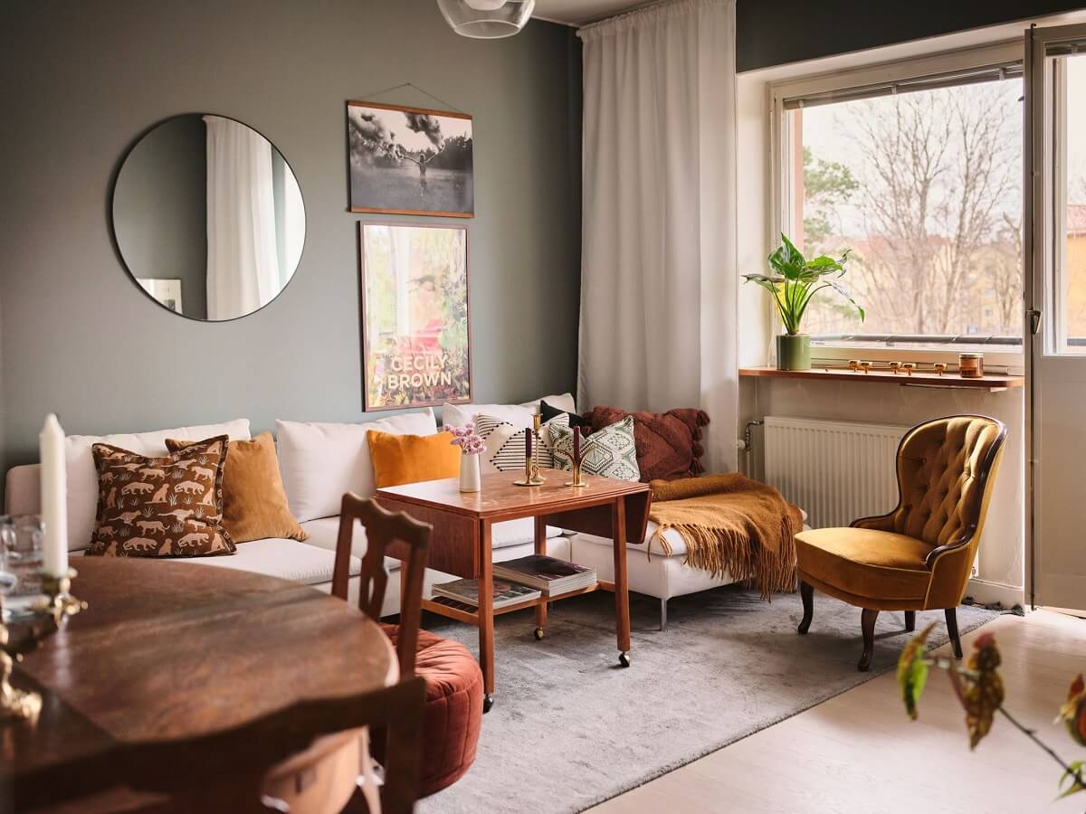 midcentury living room with gray walls and ochre yellow accents