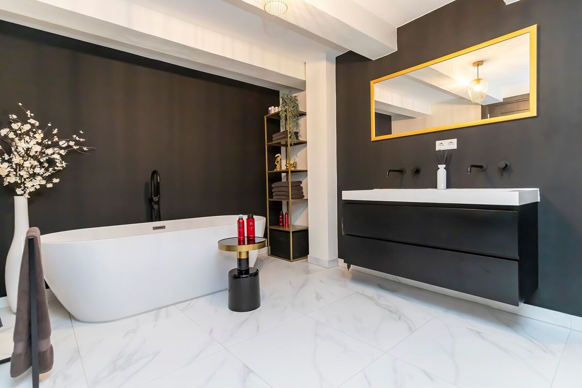 A Renovated Canal House with a Separate Pink Studio Apartment 15 modern black and white bathroom with freestanding bath