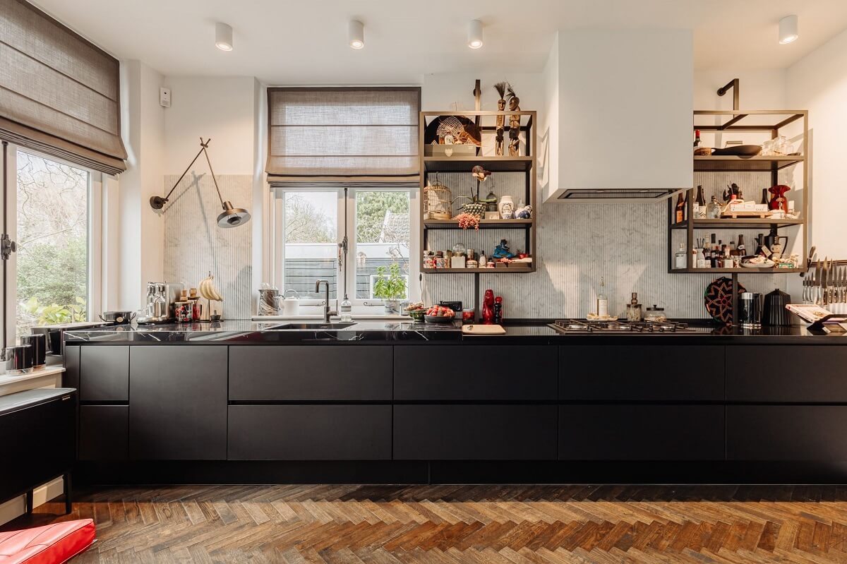 A Beautifully Renovated Dike House in The Netherlands 14 modern black kitchen cabinets with open storage