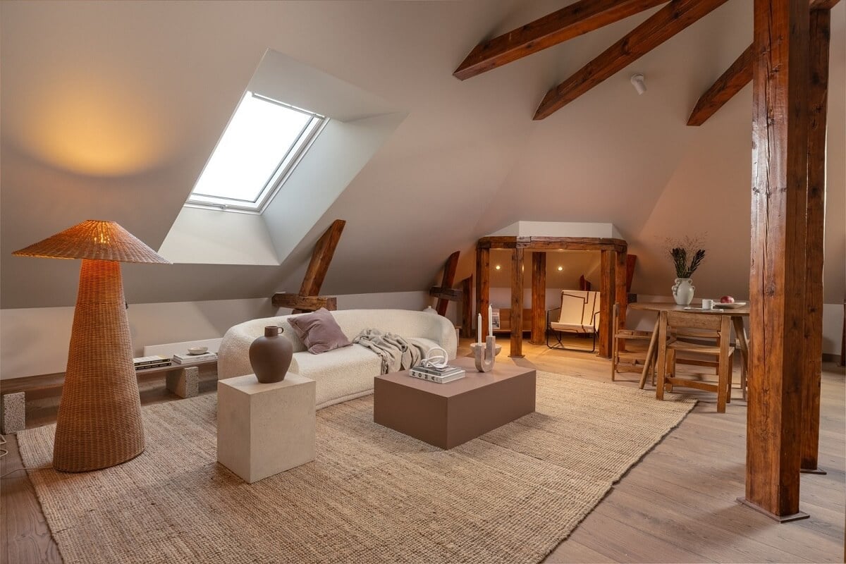 An Attic Apartment in Oslo with Exposed Wooden Beams 4 modern living room decor in scandi apartment