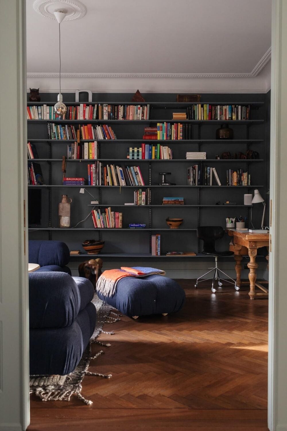 Moody Rooms in a Grand Stockholm Apartment 5 moody living room with bookshelves