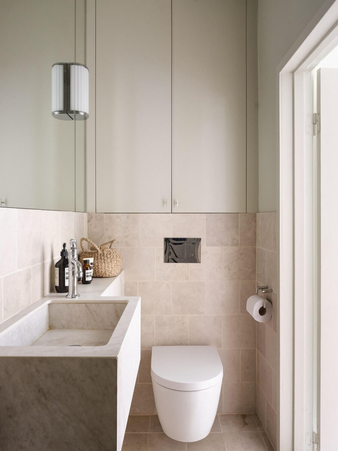 A Light Filled Duplex Apartment in Sweden 27 narrow bathroom with marble sink