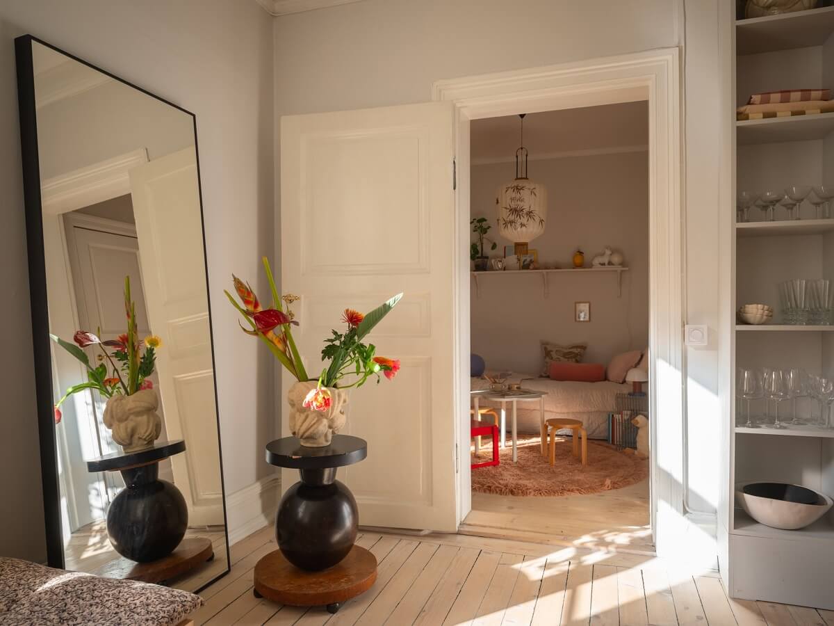 Light Rooms and Soft Color Tones in a Swedish Apartment 19 naturallight and large floor mirror