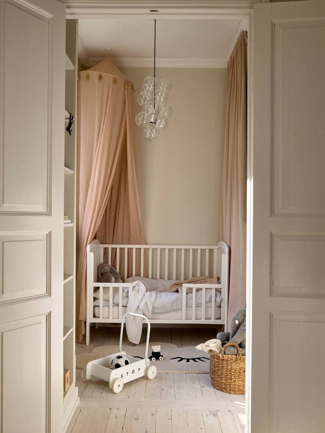 A Social Scandinavian Apartment with a Light Blue Living Room 17 neutral colored nursery