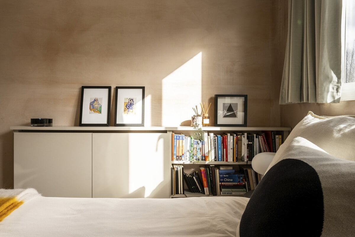 A Modern London Home with Plaster Walls 17 open and closed cabinets in bedroom