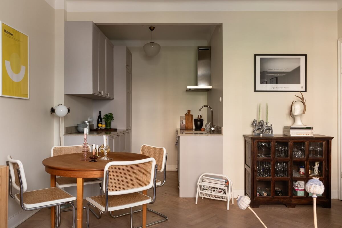 A Renovated Swedish Apartment with a Pink Bathroom 7 open plan kitchen living room with round table