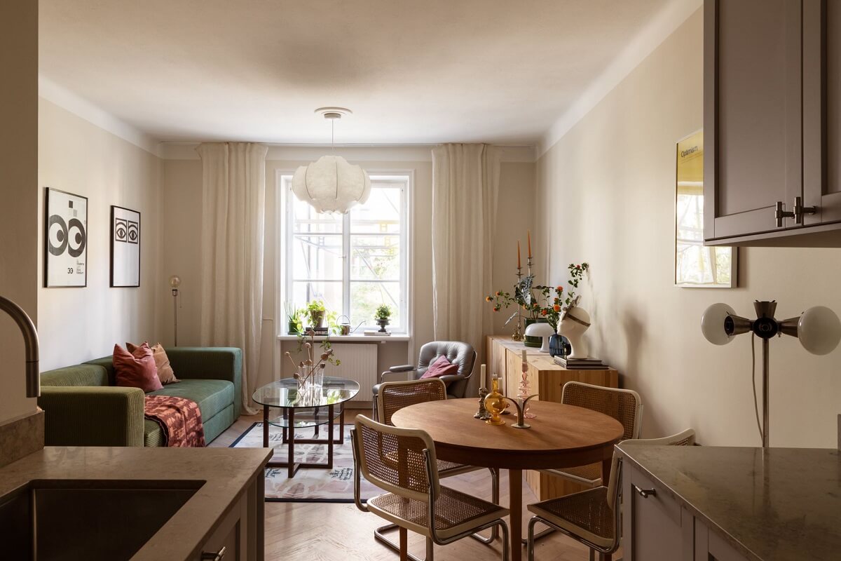 A Renovated Swedish Apartment with a Pink Bathroom 8 open plan living room kitchen with beige walls
