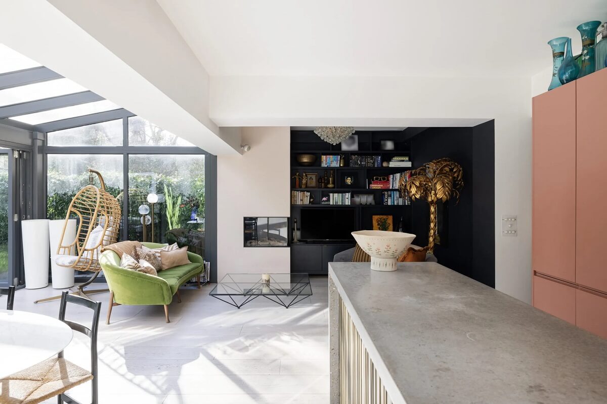 A Modern Apartment with Skylights in a Historic Building 8 open plan living room kitchen with dark accent wall