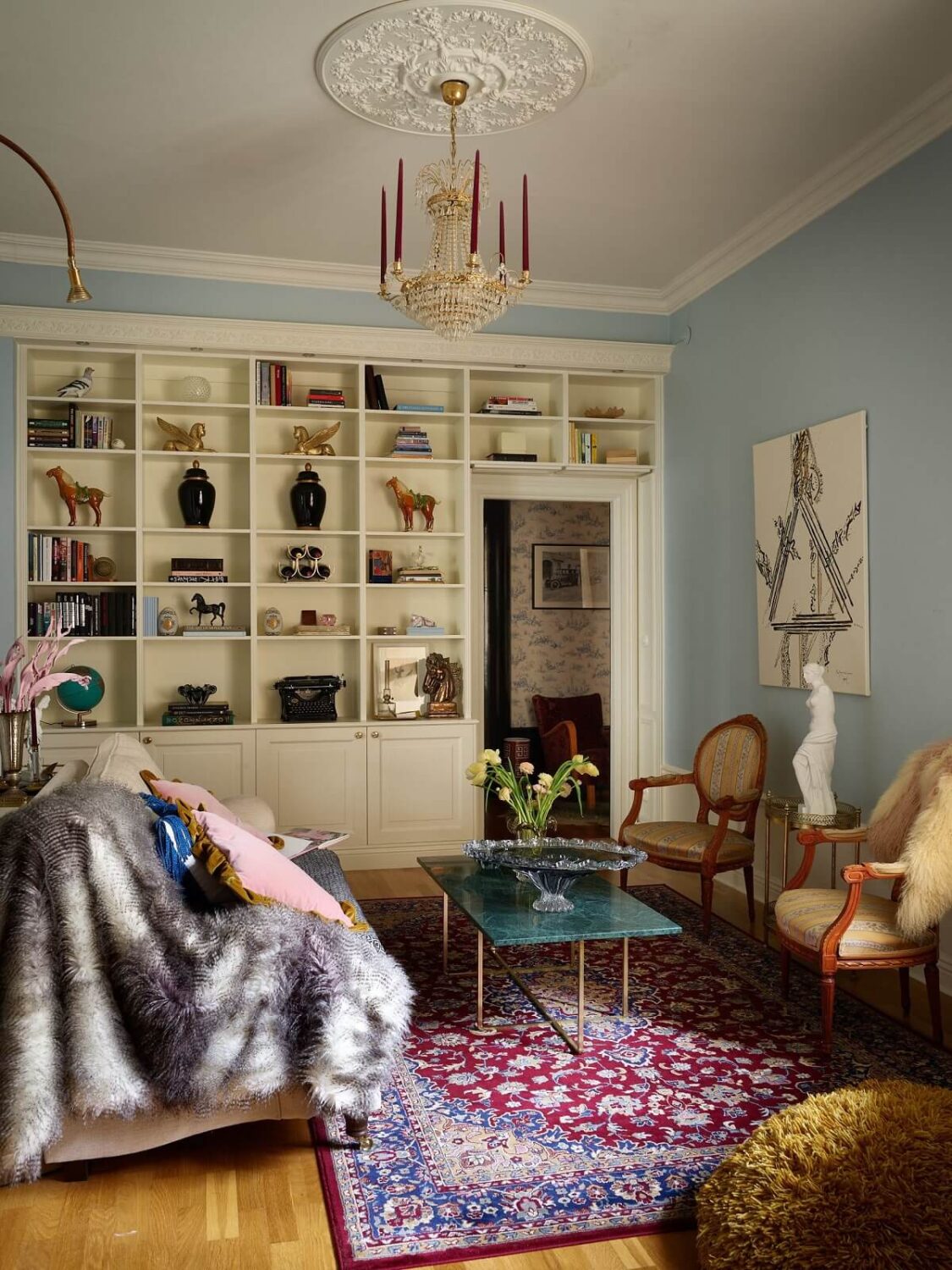 Best of 2024: Living Rooms 10 pastel-blue-walls-living-room-built-in-bookcases-nordroom