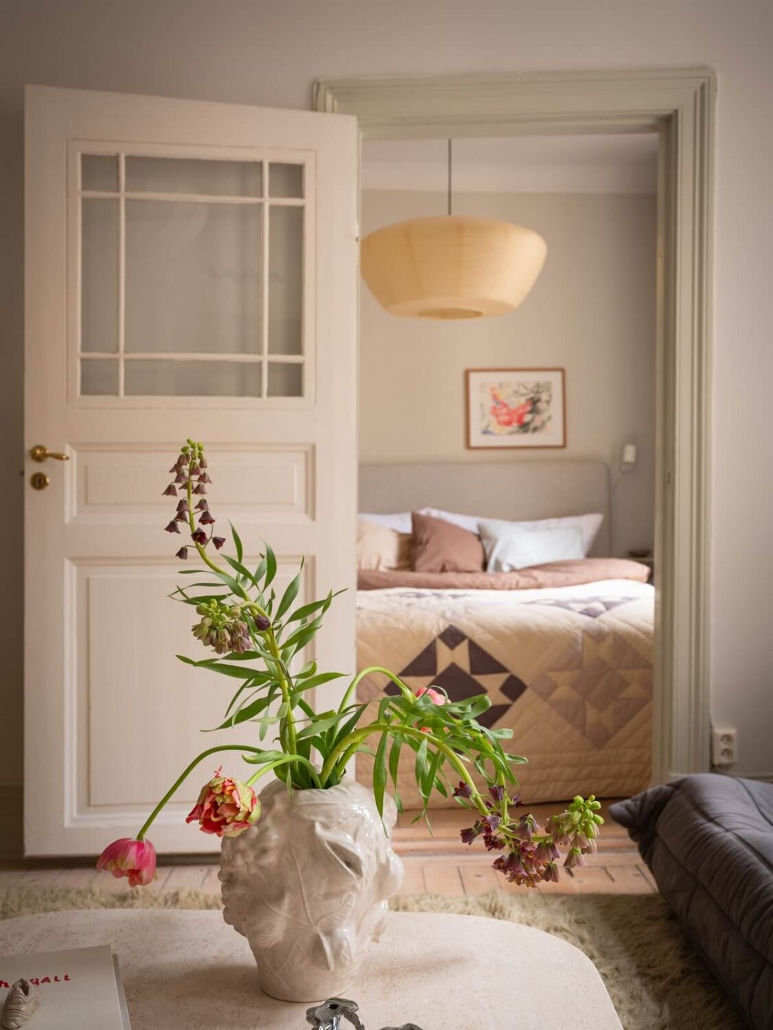 Light Rooms and Soft Color Tones in a Swedish Apartment 16 peek into serene bedroom