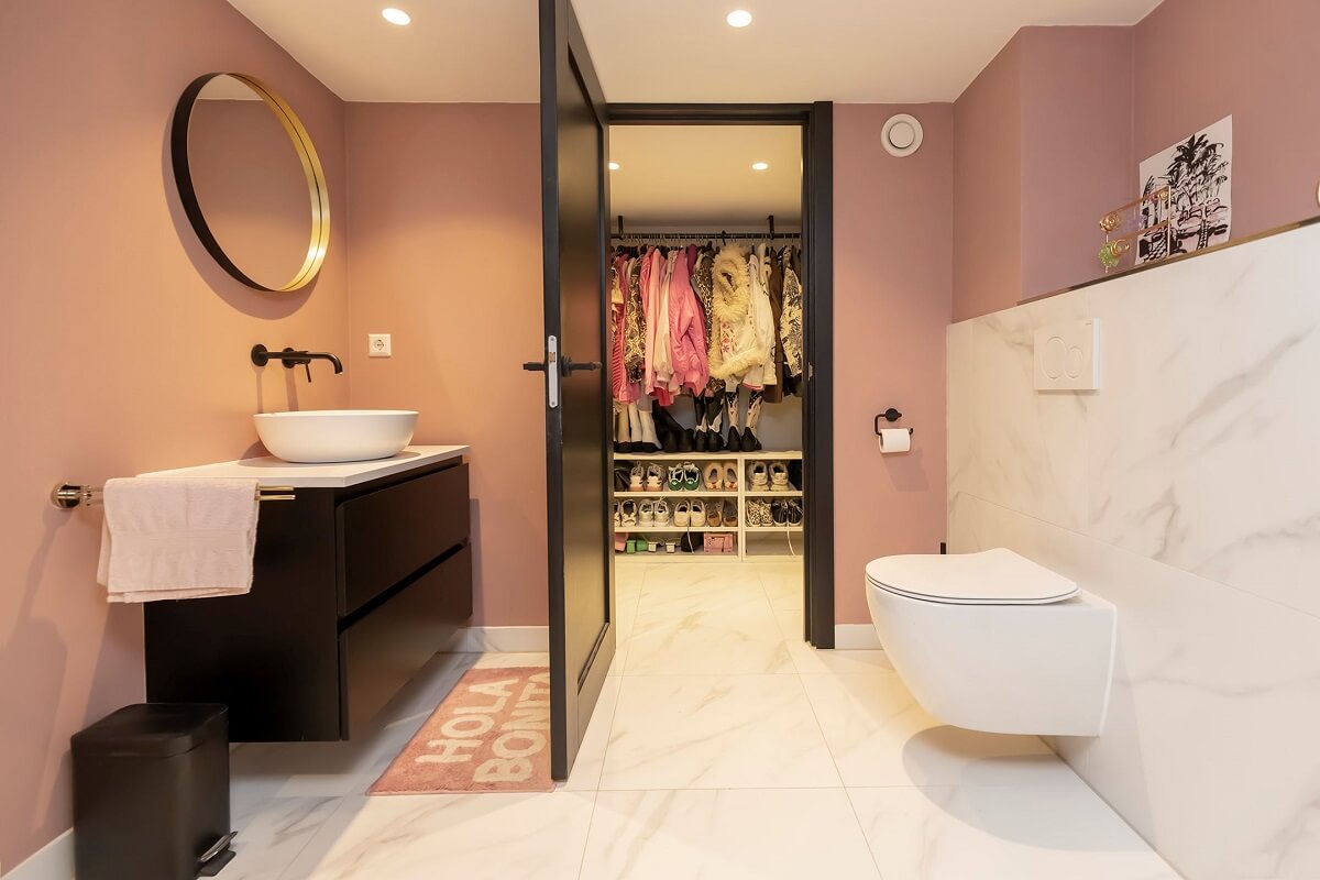 A Renovated Canal House with a Separate Pink Studio Apartment 27 pink batroom walls and black bathroom vanity