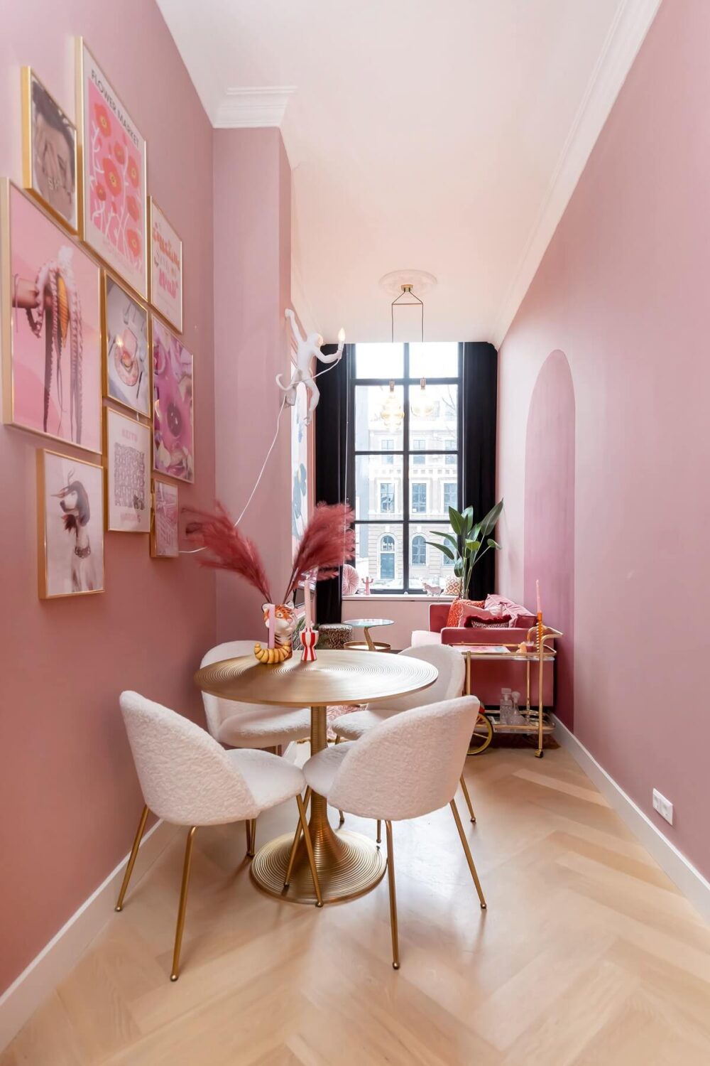 A Renovated Canal House with a Separate Pink Studio Apartment 22 pink studio apartment with small round table