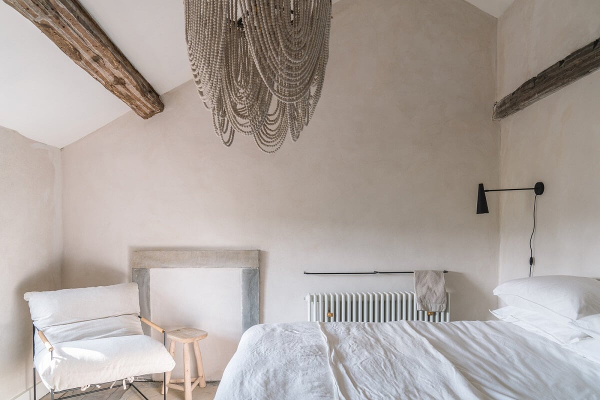 Contemporary Interiors in a Historic English House 14 pitched ceiling and exposed beams in light bedroom
