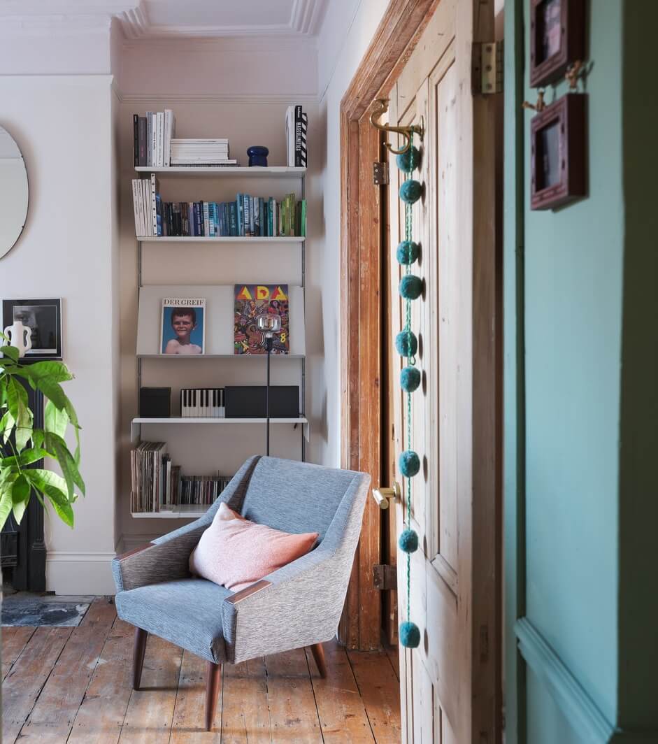 A London Home with Green Color Accents 5 reading chair with shelves