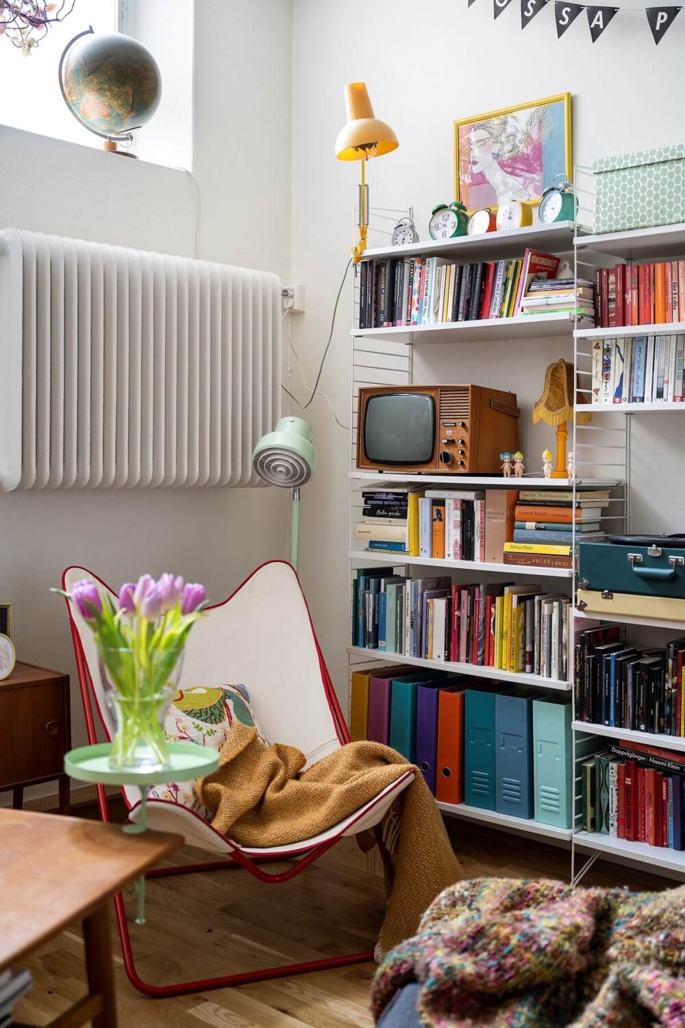 A Basement Family Apartment with Colorful Furniture and Decor 5 reading nook
