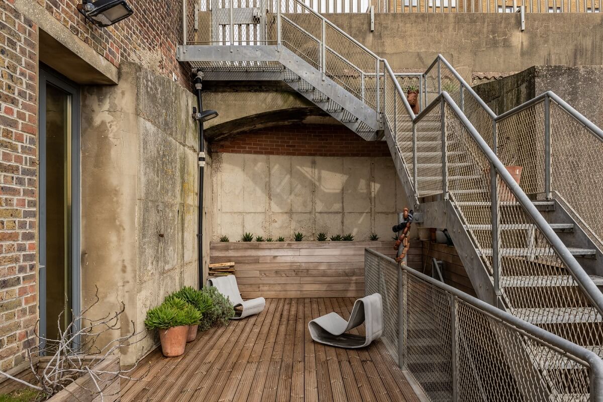 An Industrial English Loft with Yellow Color Pops 14 roof terrace