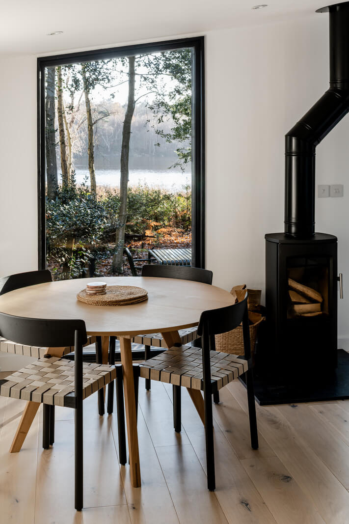 A Scandinavian-Inspired Cabin in the Woods 5 round dining table modern cabin