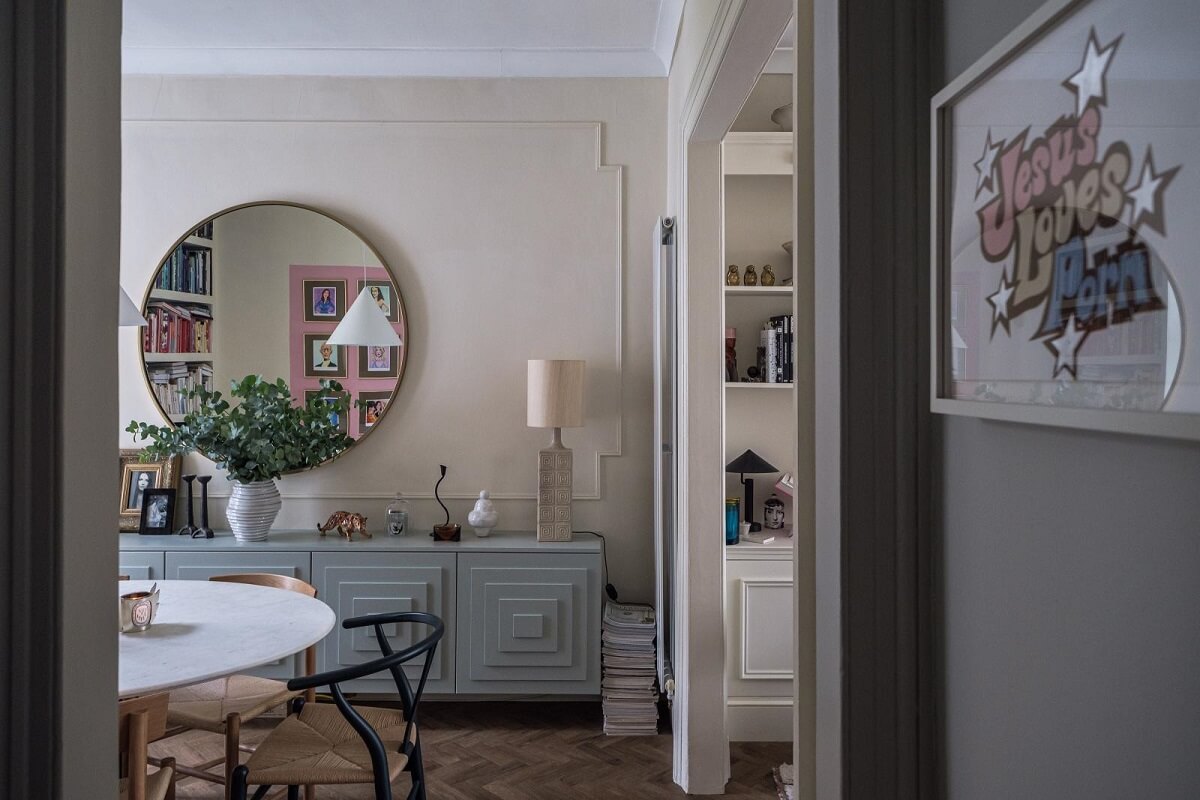 A London House Decorated in Gray and Beige Tones 9 round mirror and dining table