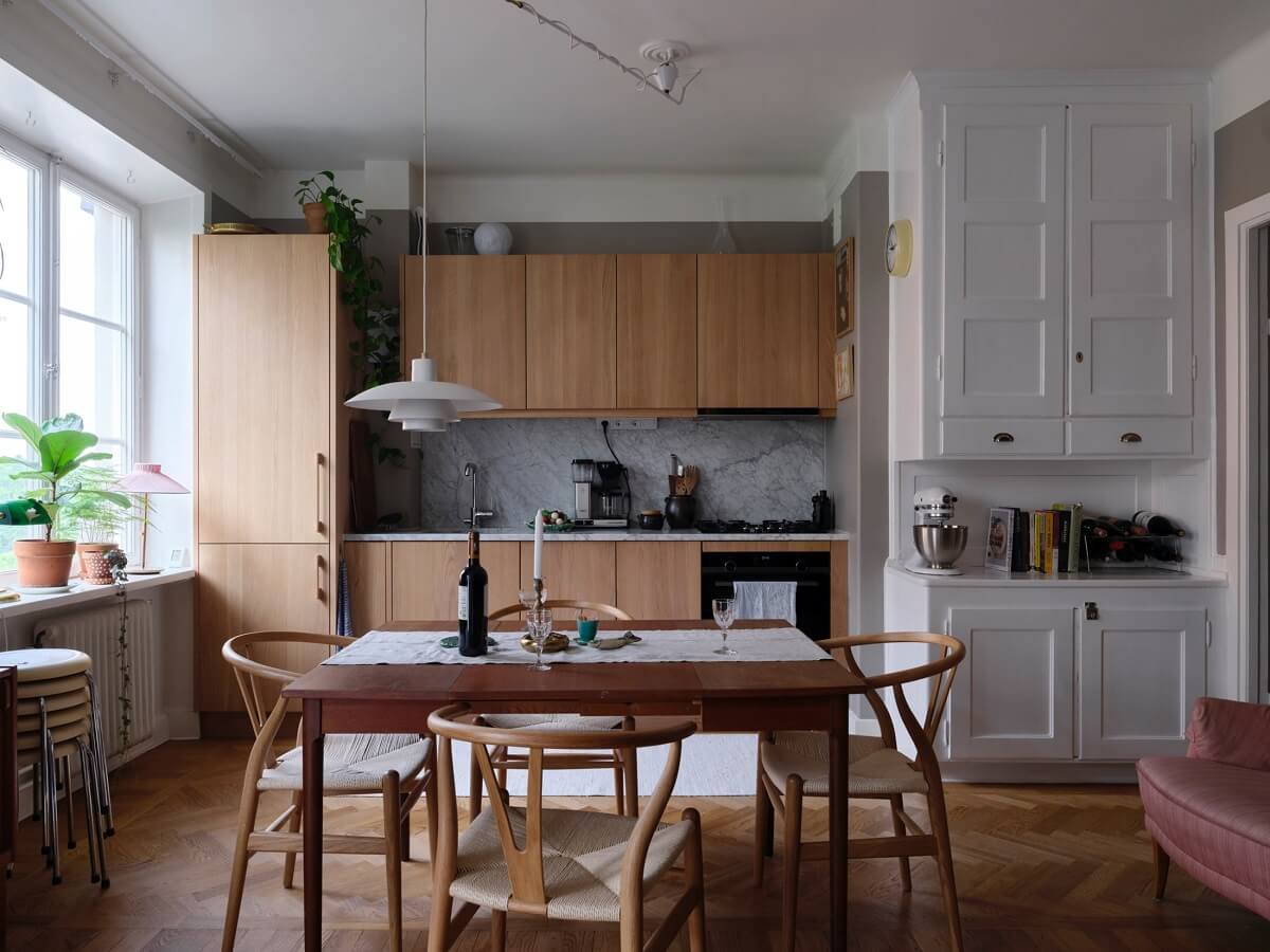 A Small Gray Apartment with Industrial Glass Walls 9 scandi apartment with oak kitchen