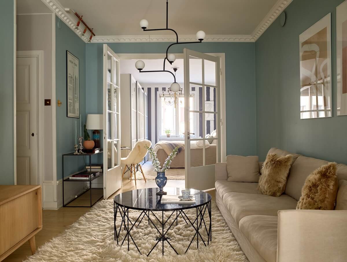 A Social Scandinavian Apartment with a Light Blue Living Room 12 scandi living room with light blue walls