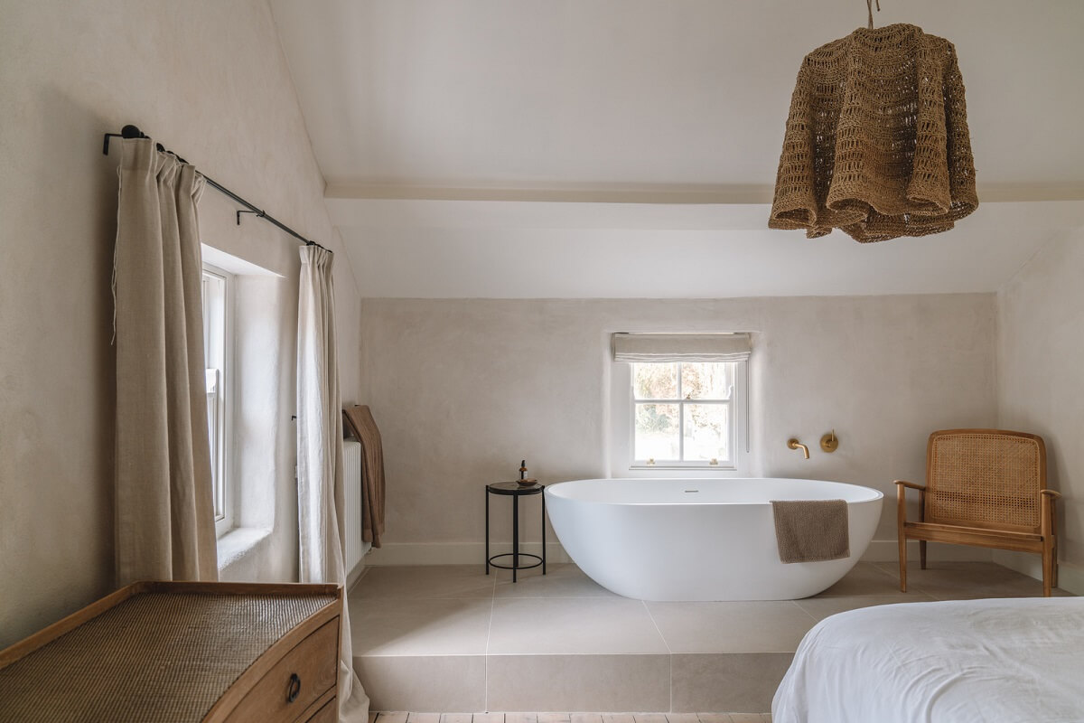 Contemporary Interiors in a Historic English House 15 serene cottage bedroom with freestanding bath