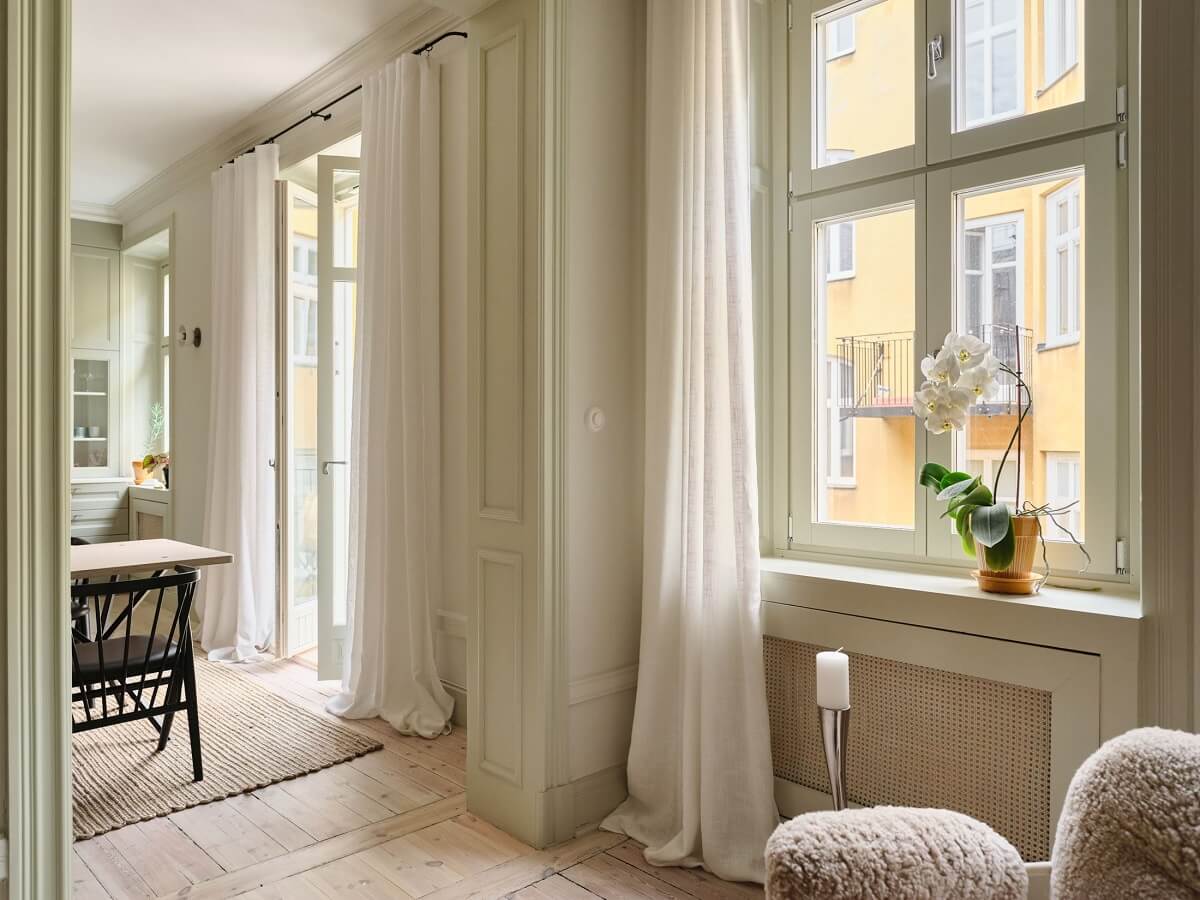 A Light Filled Duplex Apartment in Sweden 14 serene light living room kitchen