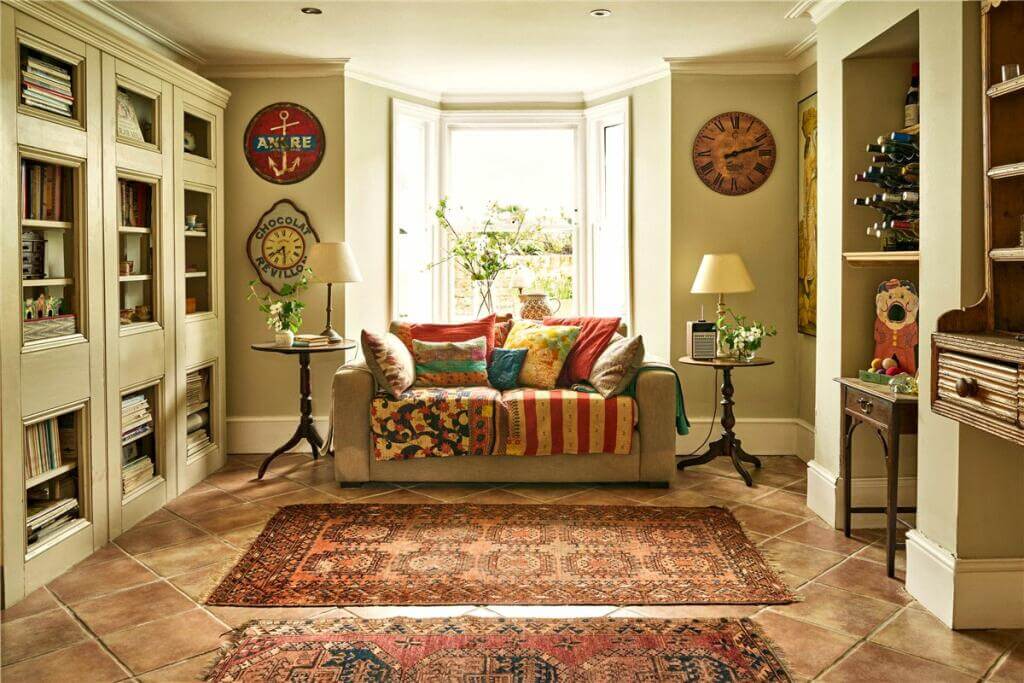 A Warm Muted Color Palette in a Victorian House 21 sitting room with built in cabinets
