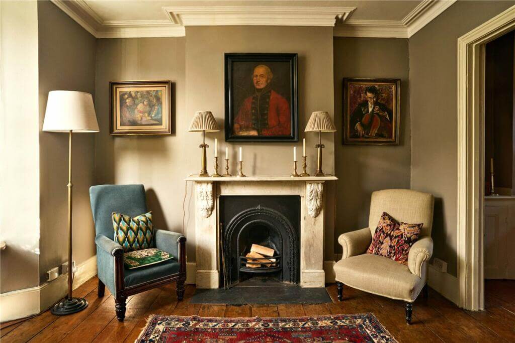 A Warm Muted Color Palette in a Victorian House 5 sitting room with fireplace