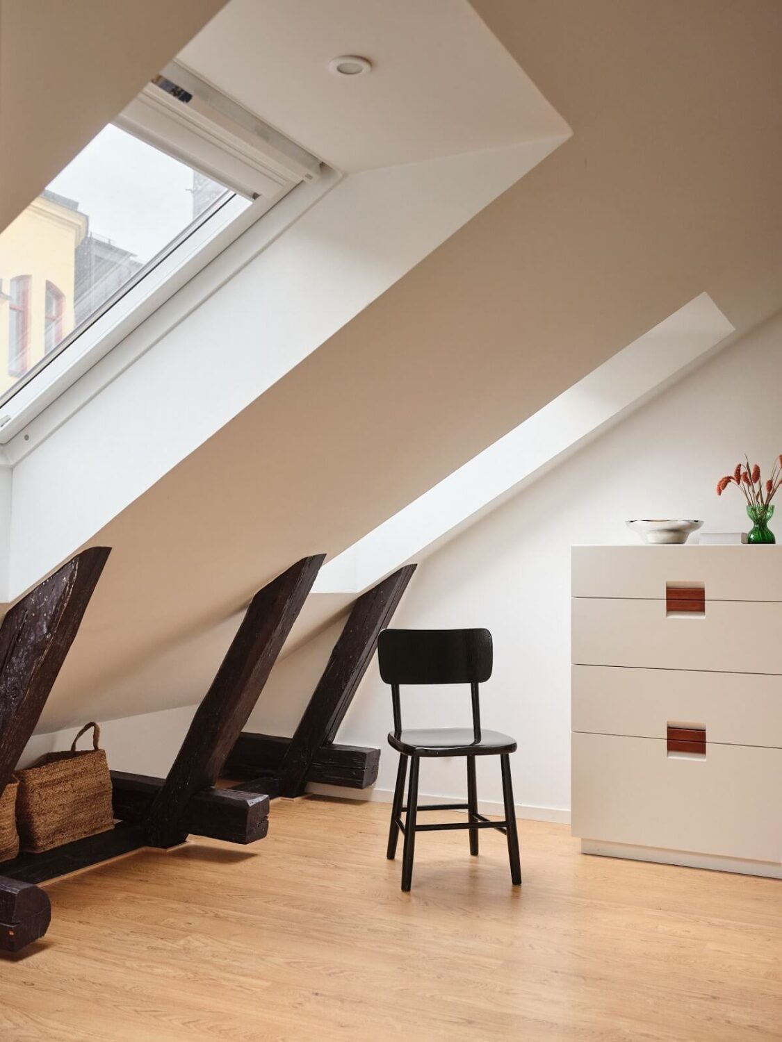 A Light Filled Duplex Apartment in Sweden 22 slanted ceilings bedroom