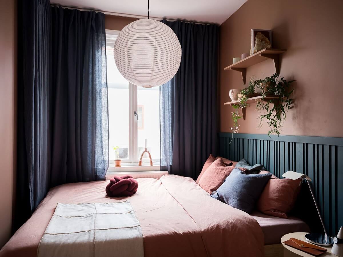 A Beautiful Color Palette in a Scandinavian Family Apartment 29 small double bedroom with terracotta and dark blue color palette nordroom